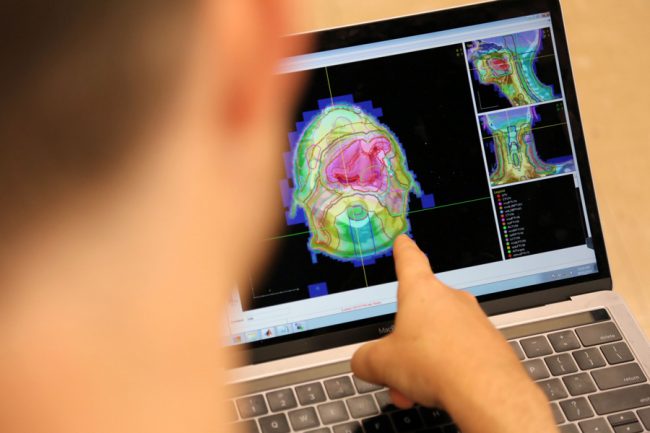 Aaron Babier (MIE PhD candidate) is using AI technology to automate radiation therapy planning. (Photo: Brian Tran)